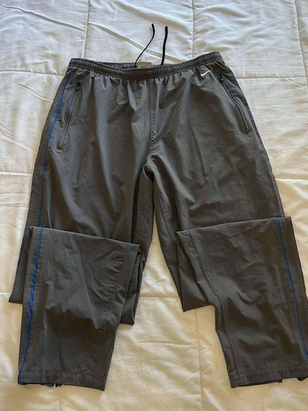 Nike vintage grey joggers with blue side stripe